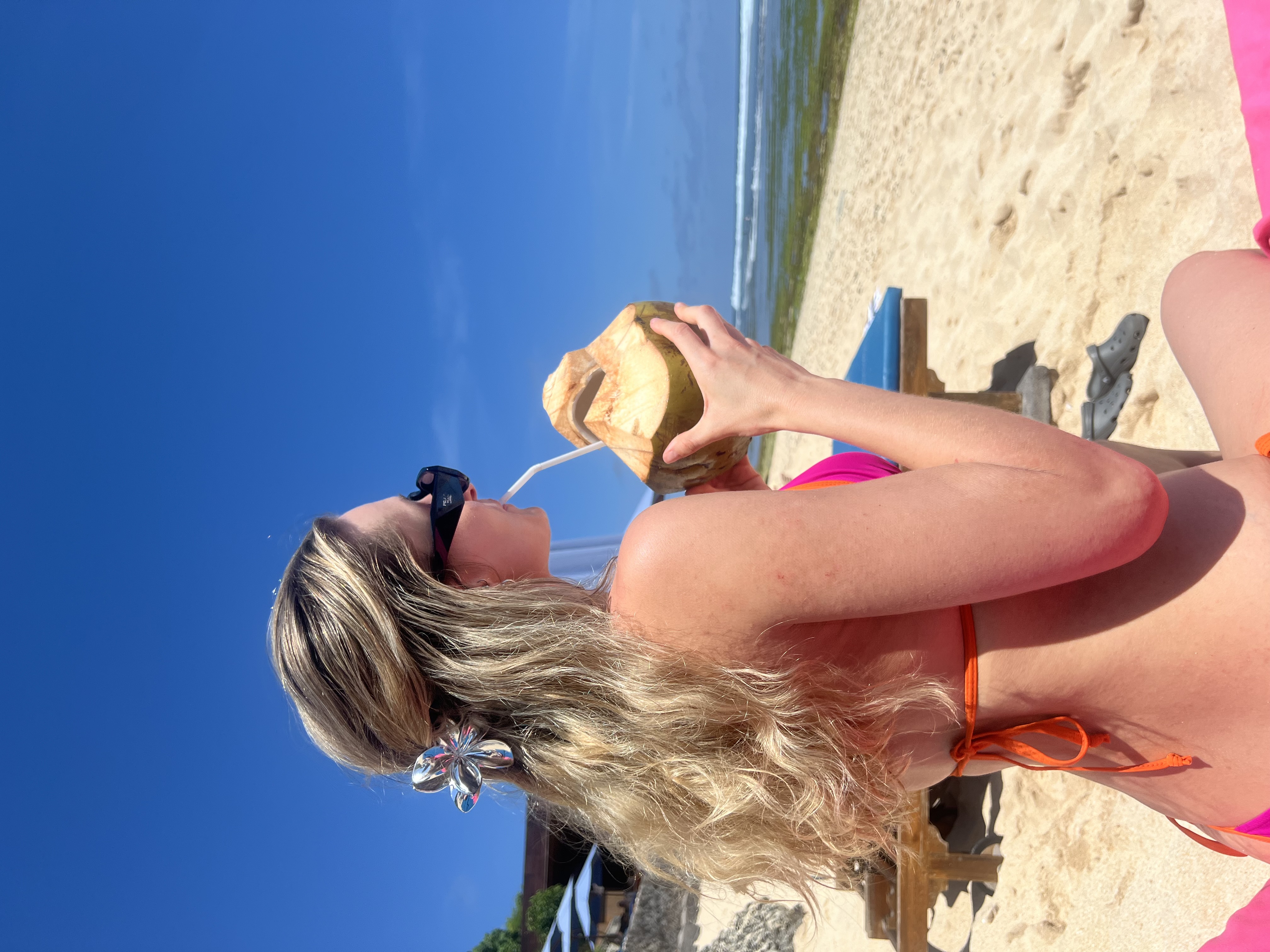 Layla on a sunlit beach
